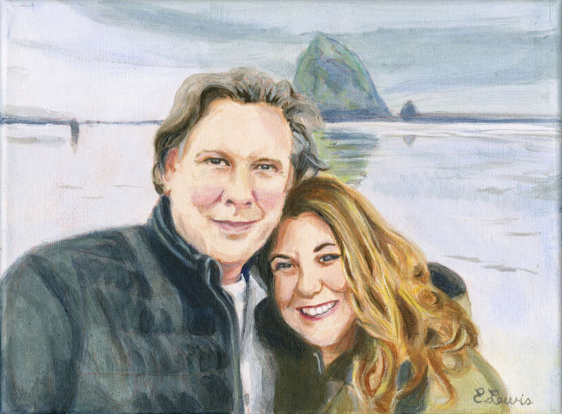 Man and Woman in front of large rock