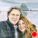 Man and Woman in front of large rock